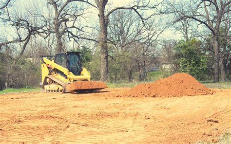 how to use a gravel level with skid steer|grading with skid steers.